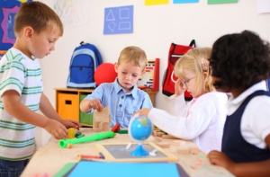 Children learning using the Montessori Method